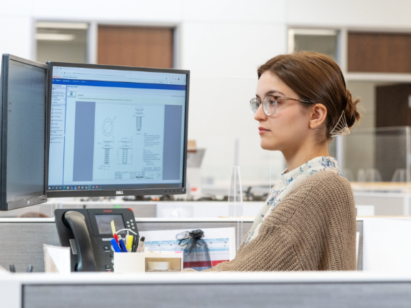 Intern working at computer