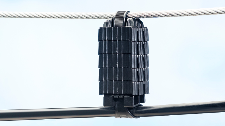 aerial support tie spacers